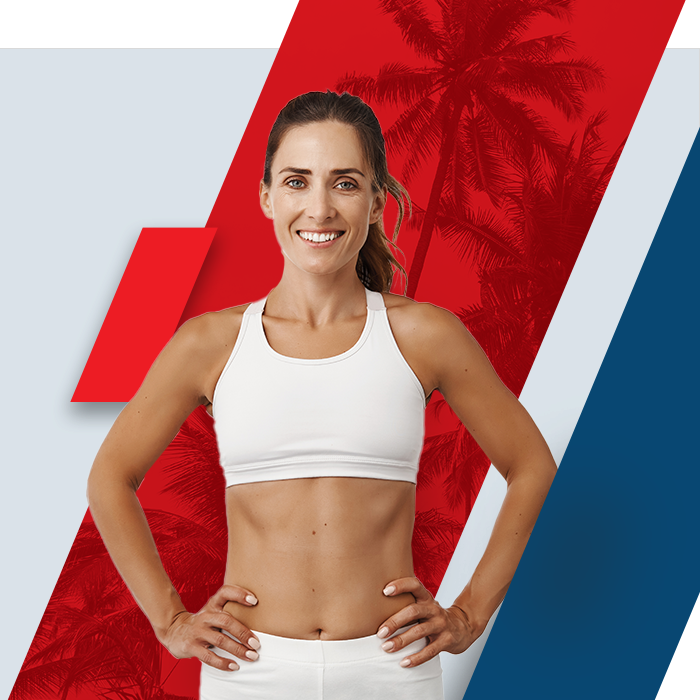 Smiling woman with a thin midsection after panniculectomy and abdominoplasty