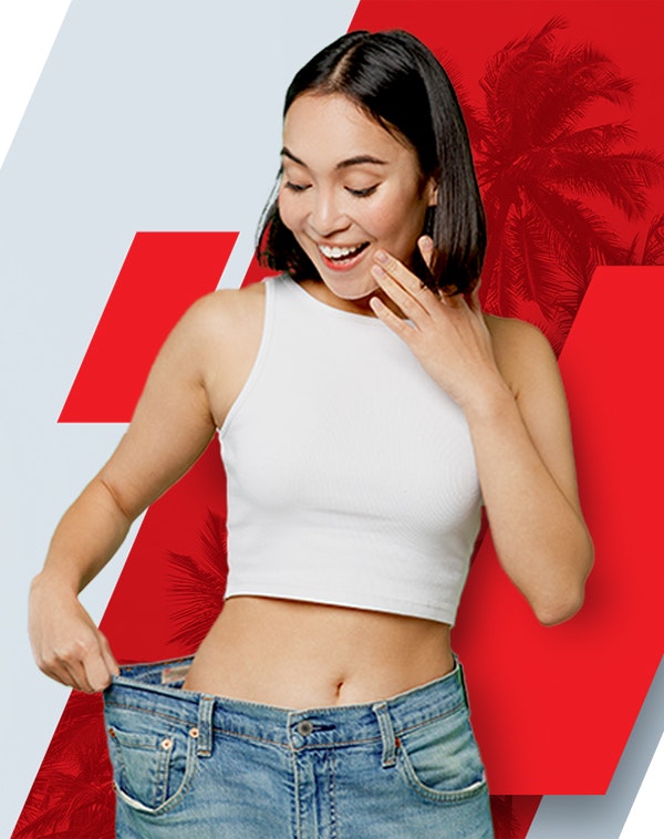 Mini gastric bypass patient showing weight loss with loose jeans