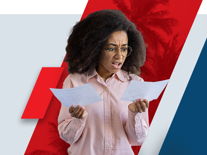 Upset woman looking at medical bills